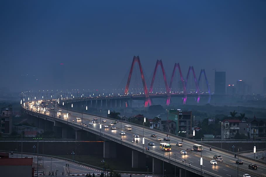 concrete bridge during nighttime, hanoi, nhat tan bridge, vietnam