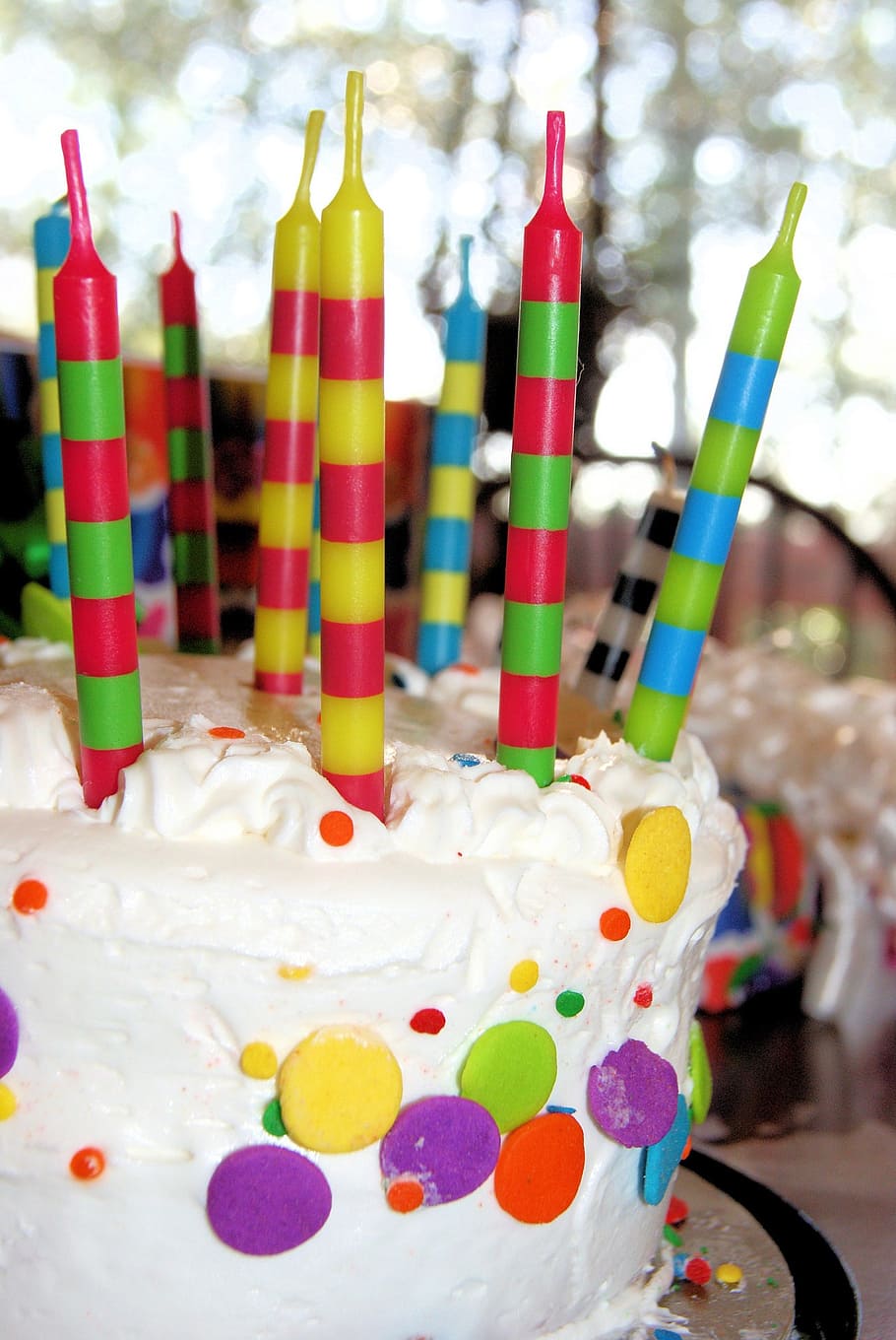 round white icing-covered icing with multicolored candles, cake HD wallpaper