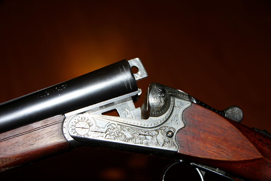 close-up photo of brown and gray flintlock gun, Double, Firearms
