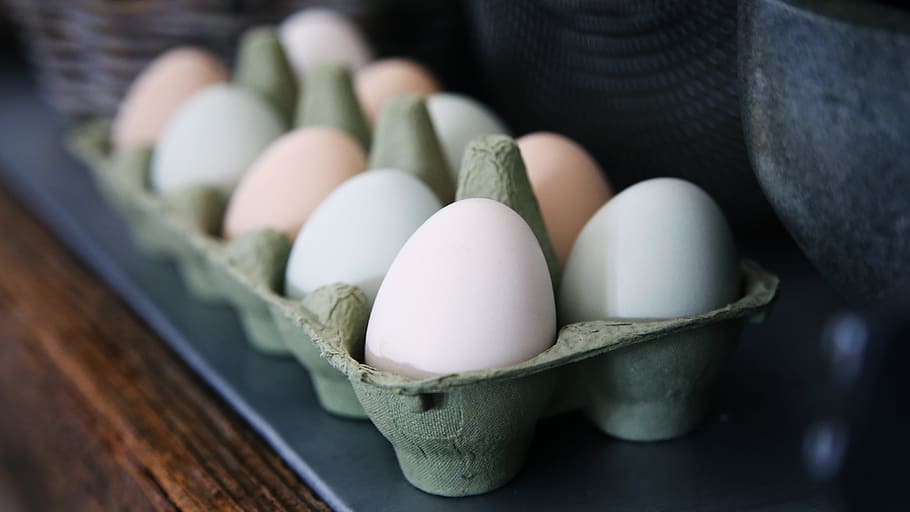 white and beige eggs on tray, chicken eggs on tray, wooden table HD wallpaper