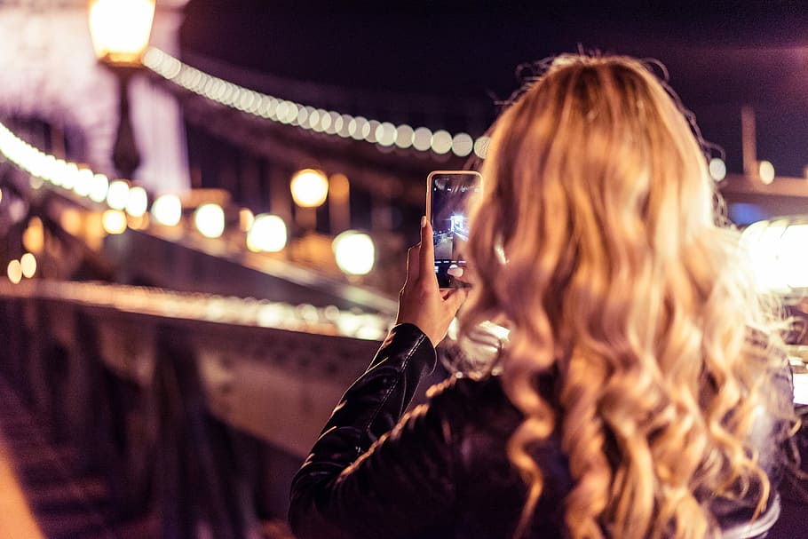 Blonde Woman Taking a Photo of an Old Bridge at Night, architecture, HD wallpaper