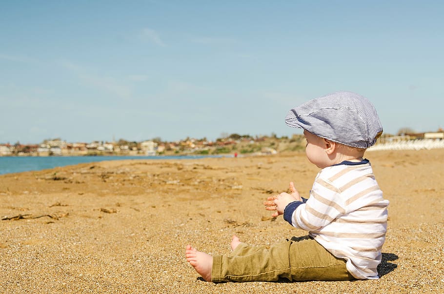 boy sitting on sand, sea, ocean, water, nature, white, kid, toddler, HD wallpaper