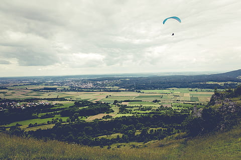 person paragliding over green grass field, Fly, Float, Paraglider HD wallpaper