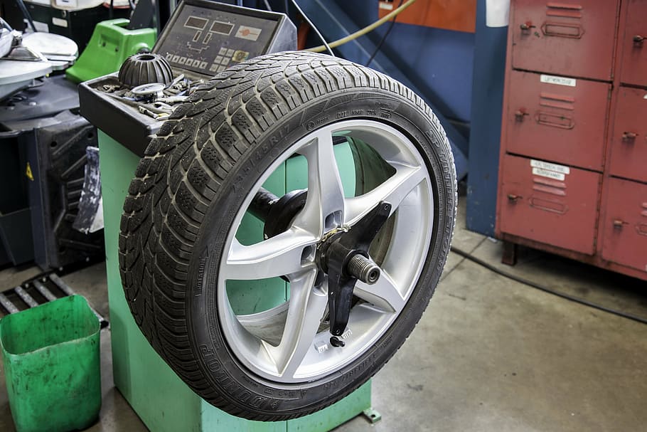 tire on wheel alignment, mature, auto, workshop, winter tires