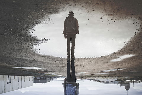 man's reflection on body of water photography, man standing near water with reflection during daytime HD wallpaper