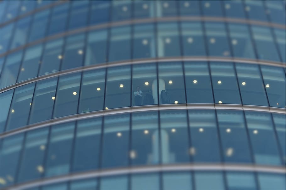 low-angle photography of glass wall building, person, standing HD wallpaper