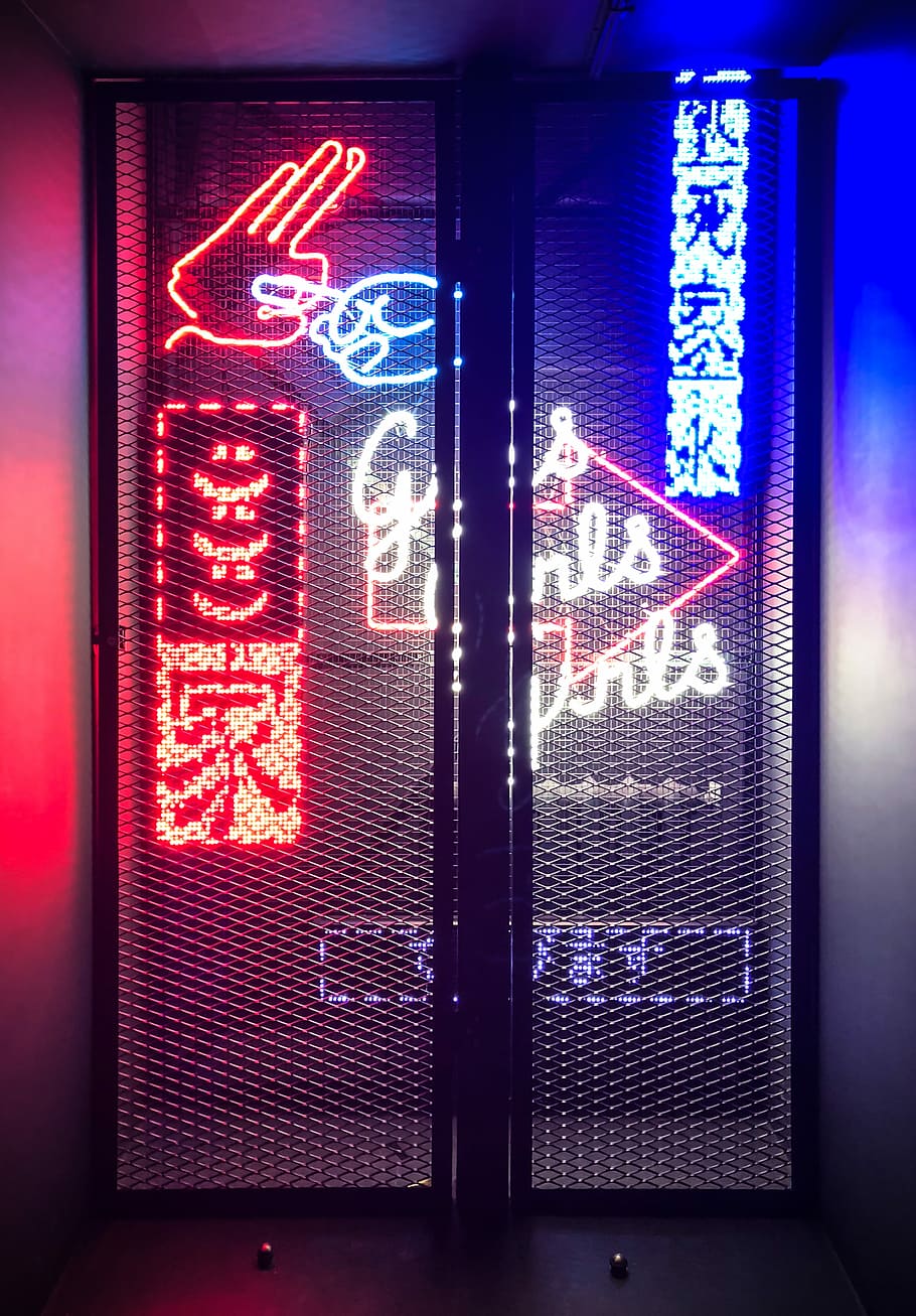 black metal mesh gate in front of LED signages, turned on neon light signages, HD wallpaper