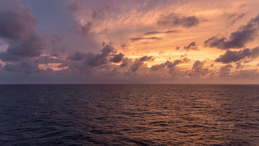 body of water during golden hour, sunset, sun rays, reflection HD wallpaper