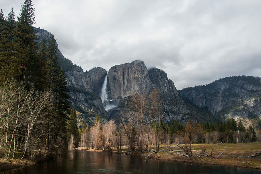 landscape photography of river along mountain, mountains during daytime HD wallpaper