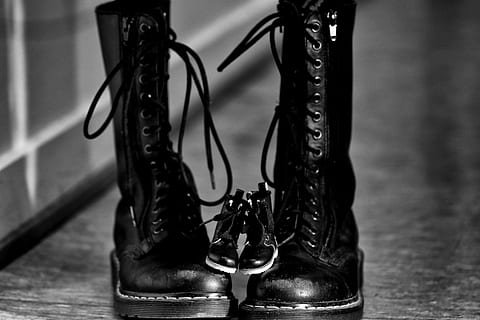 pair of black leather combat boots in grayscale photography HD wallpaper
