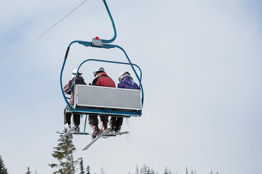 Three Skiers on Ski Lift, cold, family, mountains, people, room for text
