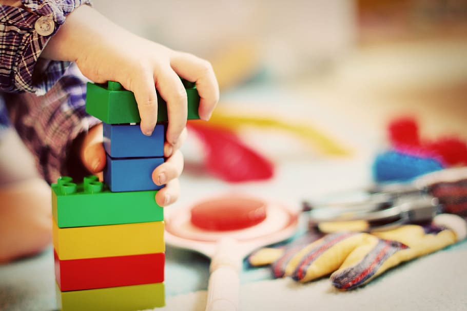 person holding LEGO blocks, child, tower, wooden blocks, kindergarten, HD wallpaper