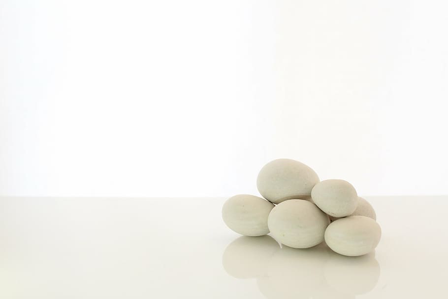 pile of white stones with white background, smooth stones, message therapy, HD wallpaper