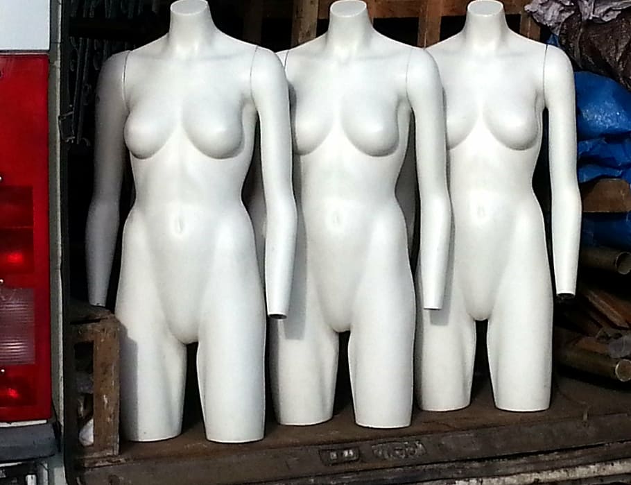 three white mannequins, dummies, female, fashion, display, retail