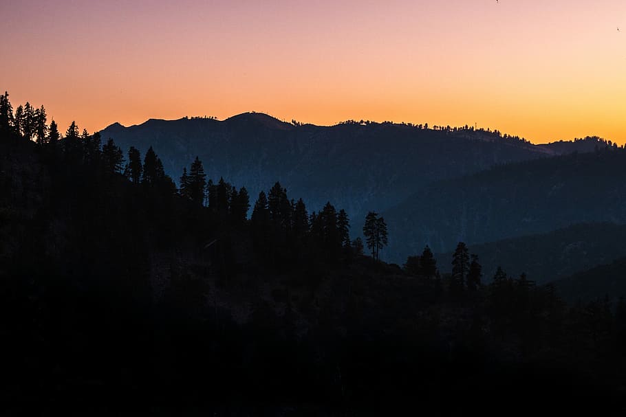 silhouette of mountains under clear sky, mountain covered with tree HD wallpaper