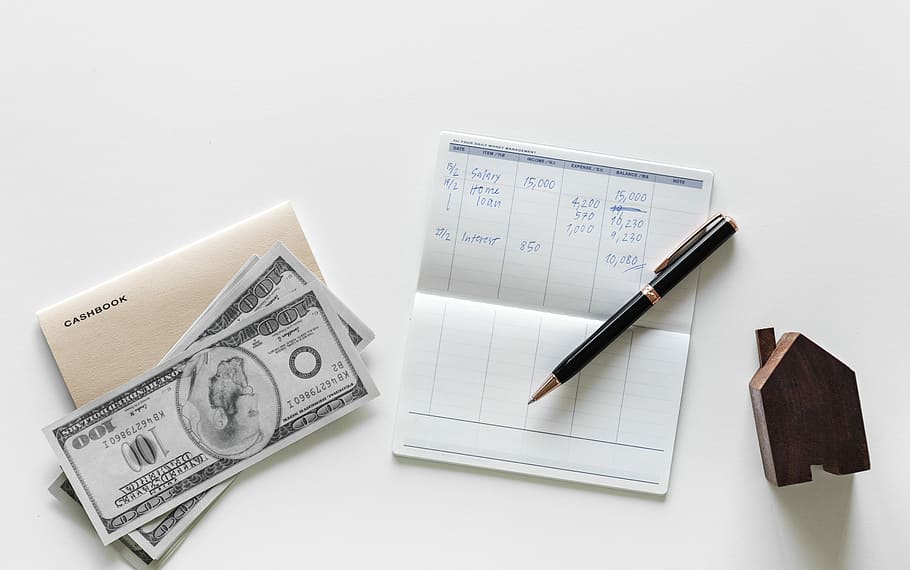 black click pen on passbook beside 100 U.S. dollar banknote HD wallpaper