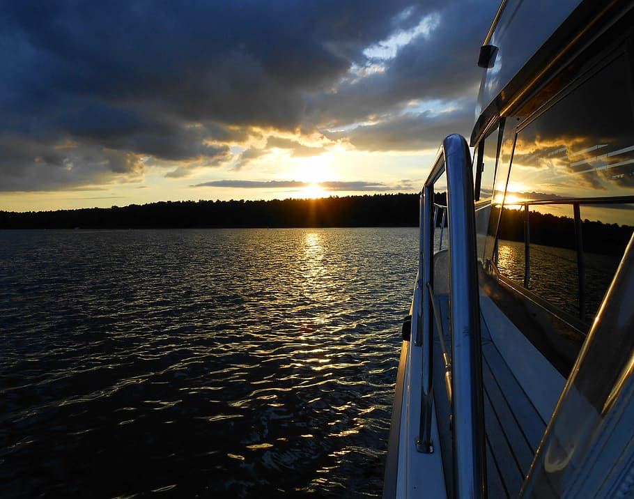 lake, sunset, water, ship, dark clouds, reeling, nature, sky HD wallpaper