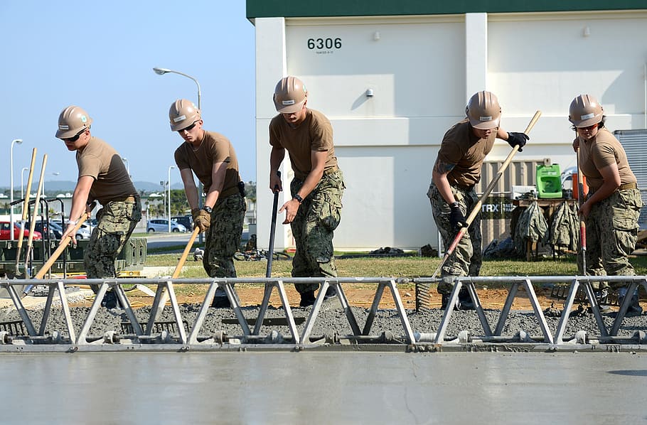 soldier holding rake near building, construction, concrete HD wallpaper