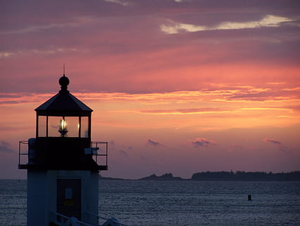 white and black lighthouse sunset, water, sky, skyline, clouds HD wallpaper