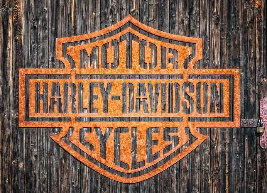 HD wallpaper: shallow focus of brown Motor Harley-Davidson cycles logo, harley  davidson | Wallpaper Flare