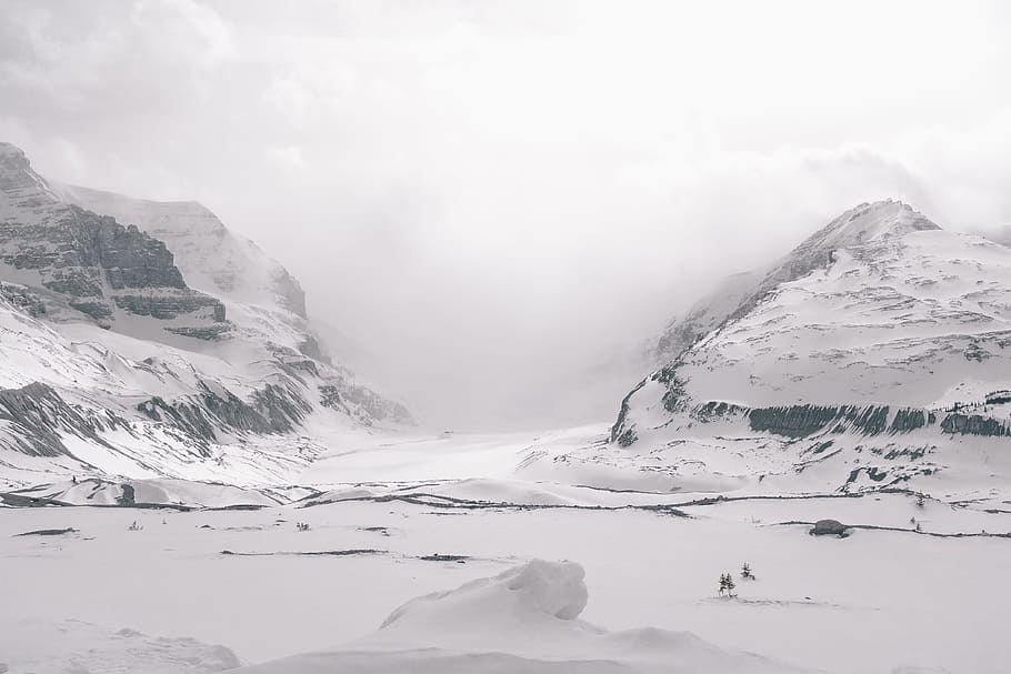 gray sand field and mountains, snow covered mountains, daytime HD wallpaper