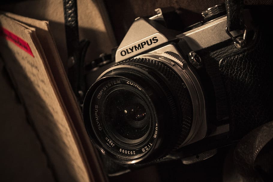 gray Olympus camera beside book, photo, old, retro, camera - photographic equipment HD wallpaper