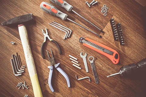 assorted handheld tools on wooden parquet, construct, craft HD wallpaper