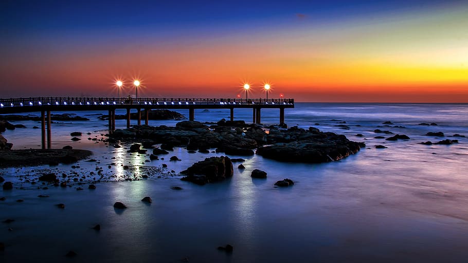 dock and rock formation during sunset, water, dusk, dawn, sea