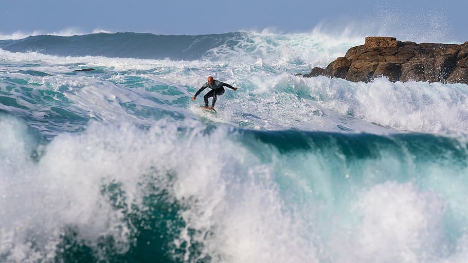 surfer-surfing-wave-beach.jpg