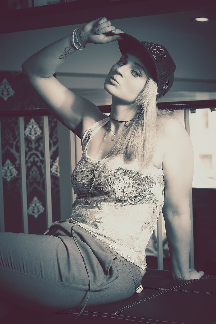 track, go, unique, design, model, sitting, baseball cap, posing HD wallpaper
