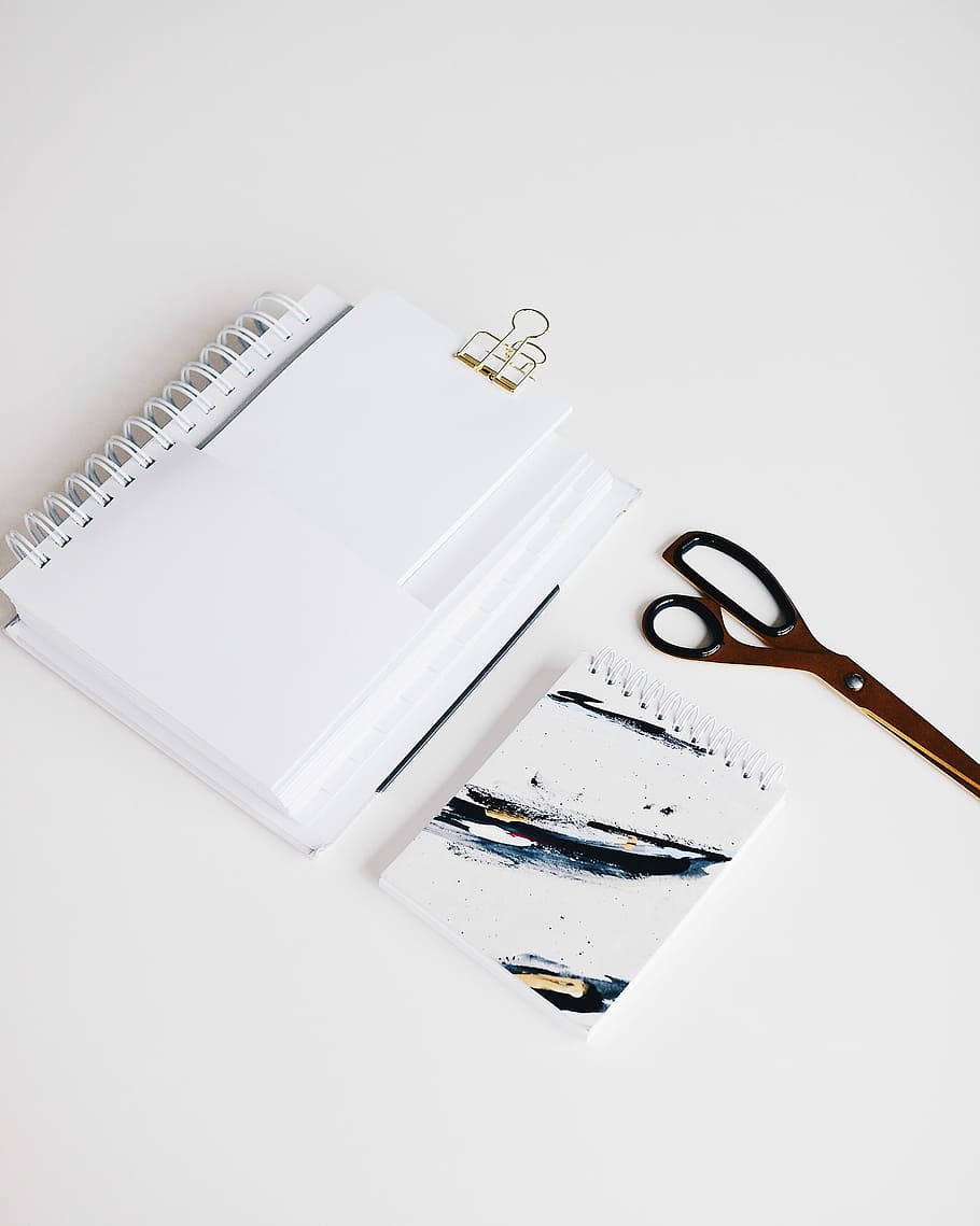 brown scissors near notebooks, white notebook, clip, spiral, paper HD wallpaper