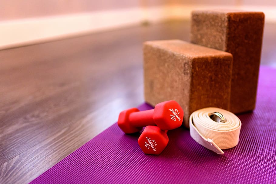 two red dumbbells on purple yoga mat, fitness, block, health