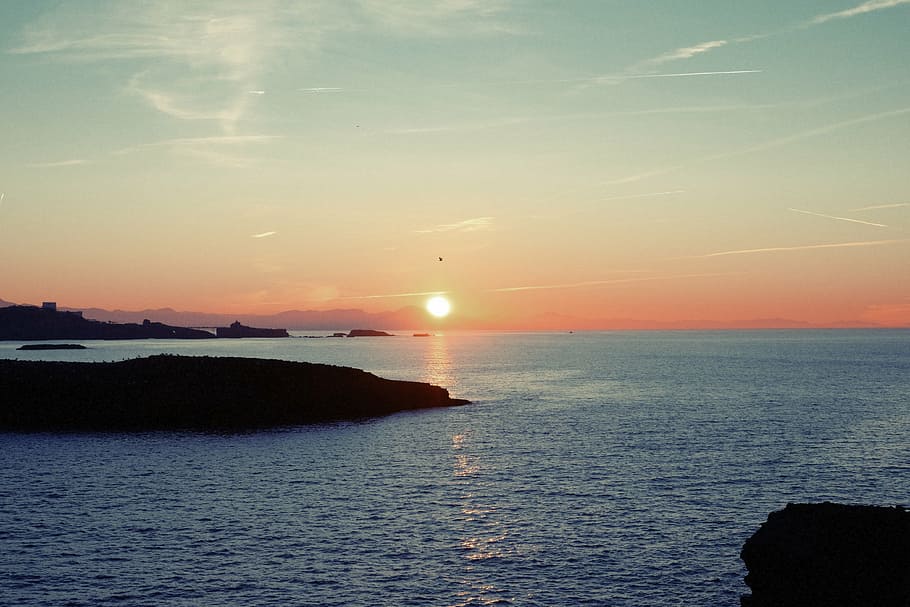 body of water during golden hour, ocean, sunset, photo, sky HD wallpaper