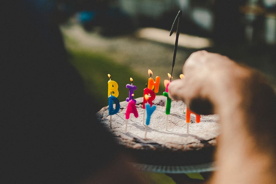 person holding birthday cake, birthday cake, happy, candle, happy birthday