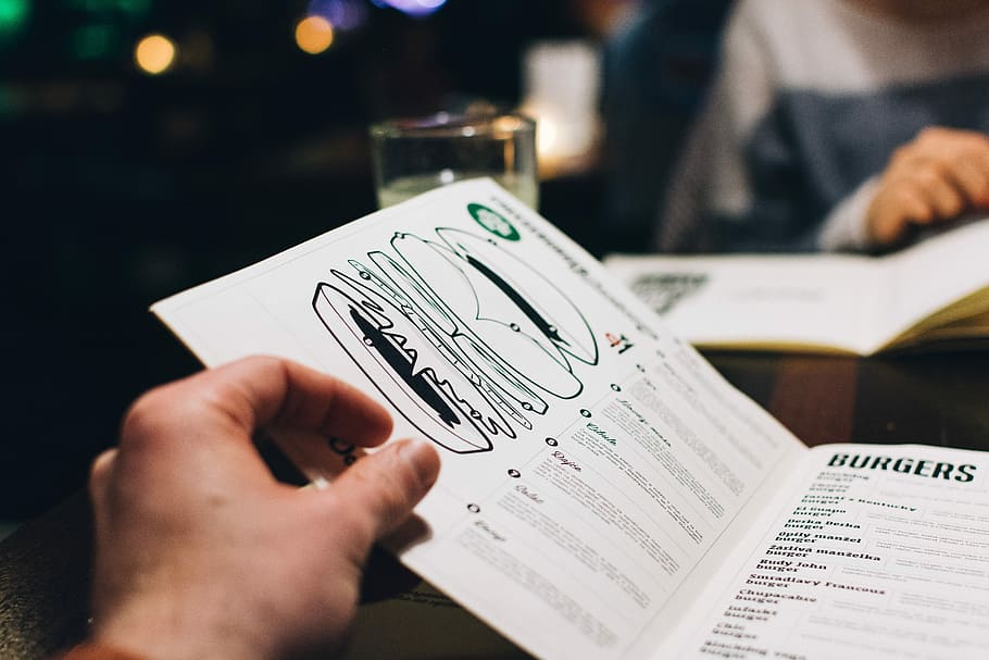 Choosing from a menu, bar, close up, hands, restaurant, people HD wallpaper