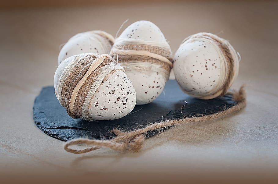 four white eggs on brown table, easter eggs, tinker, deco, decoration HD wallpaper