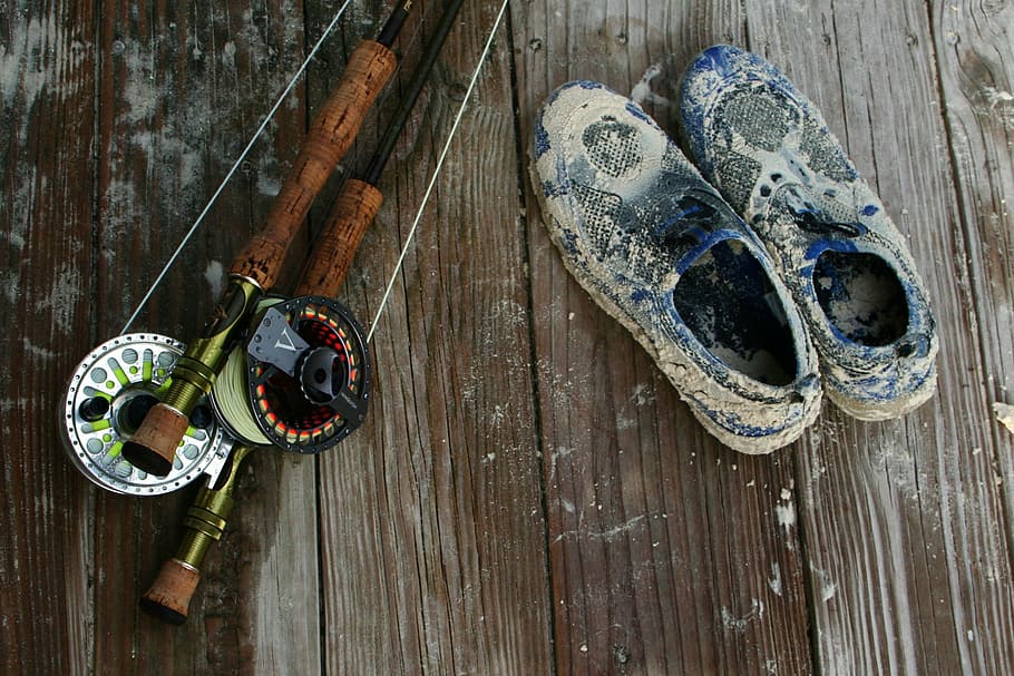 brown fishing rod beside blue low-top sneakers, fly rod, fly fishing