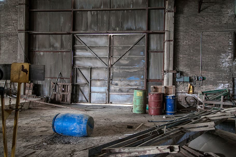 storage house photography, metallic door, destruction, abandoned factory