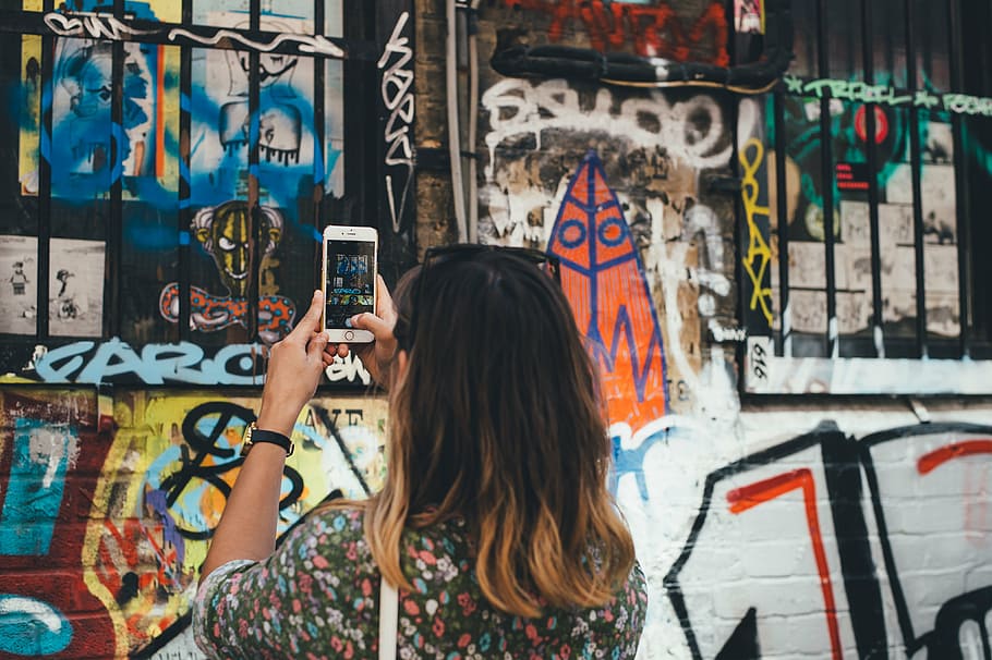 woman taking picture of wall art, creativity, graffiti, iphone HD wallpaper