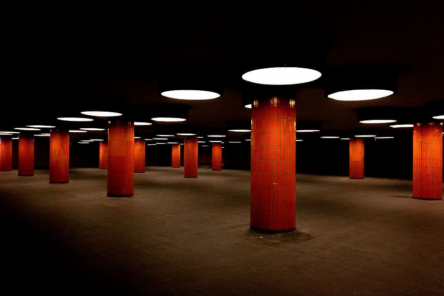 red post under ceiling light at night, red lighted columns, parking garage, HD wallpaper