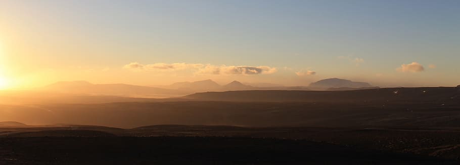 silhouette of mountains during golden hour, sunset, panorama HD wallpaper