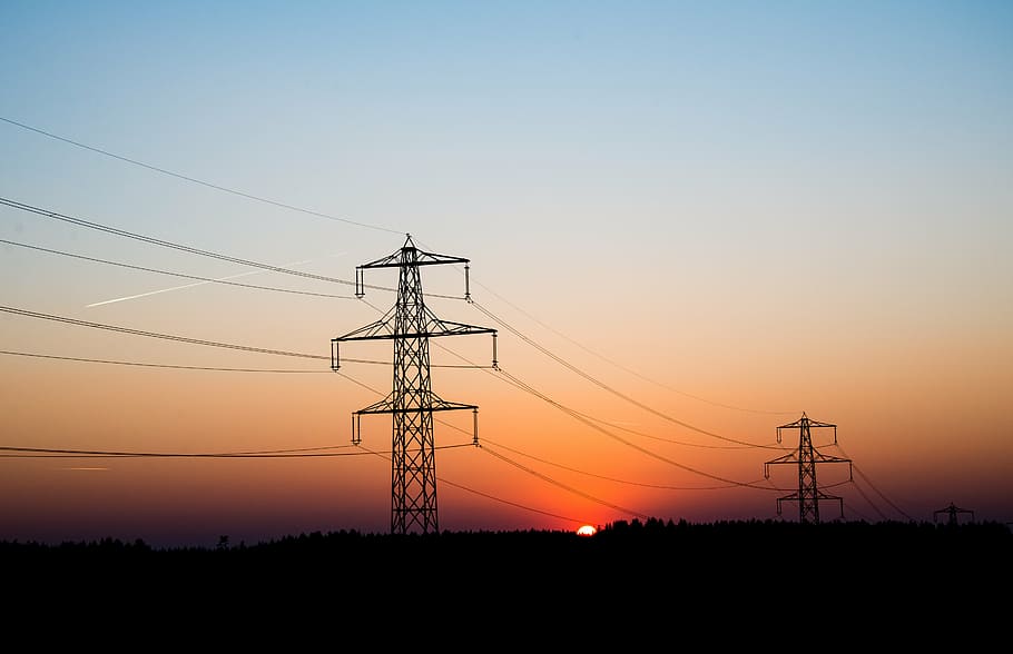 two electric towers during sunset, power poles, landscape, red, HD wallpaper