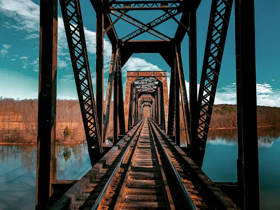 brown train rail, brown metal bridge below body of water, structure, HD wallpaper