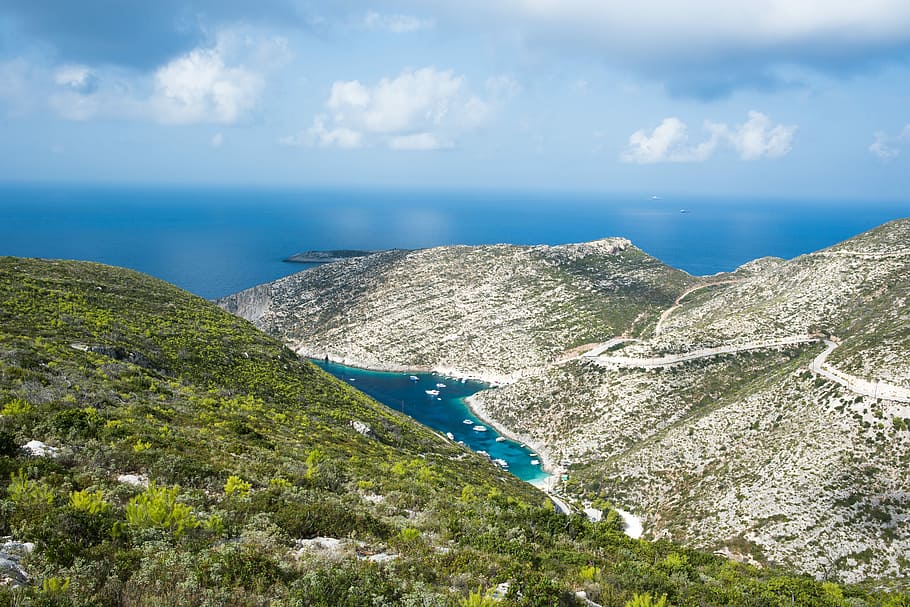 aerial photography of fjord, aerial photography of mountains near body of water during daytime HD wallpaper