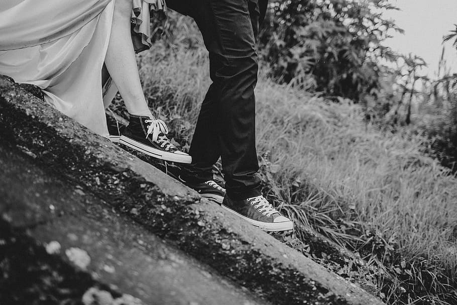 grayscale photography of man and woman standing on ground, grayscale photo of man and woman walking near grass, HD wallpaper