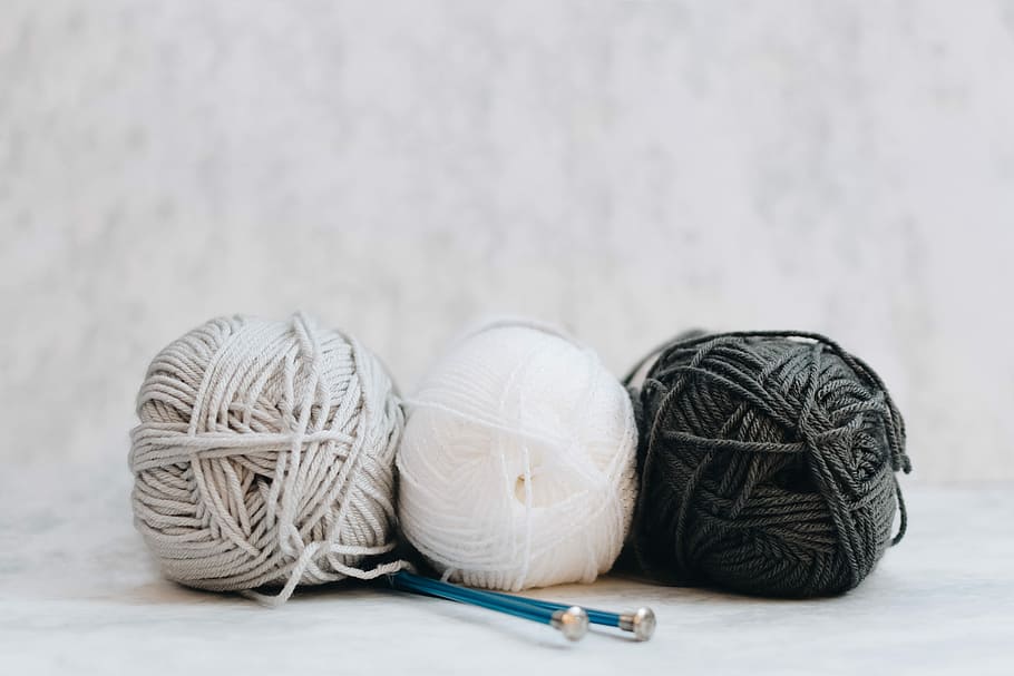 white, gray, and black yarns, three gray, white, and black yarn spools HD wallpaper