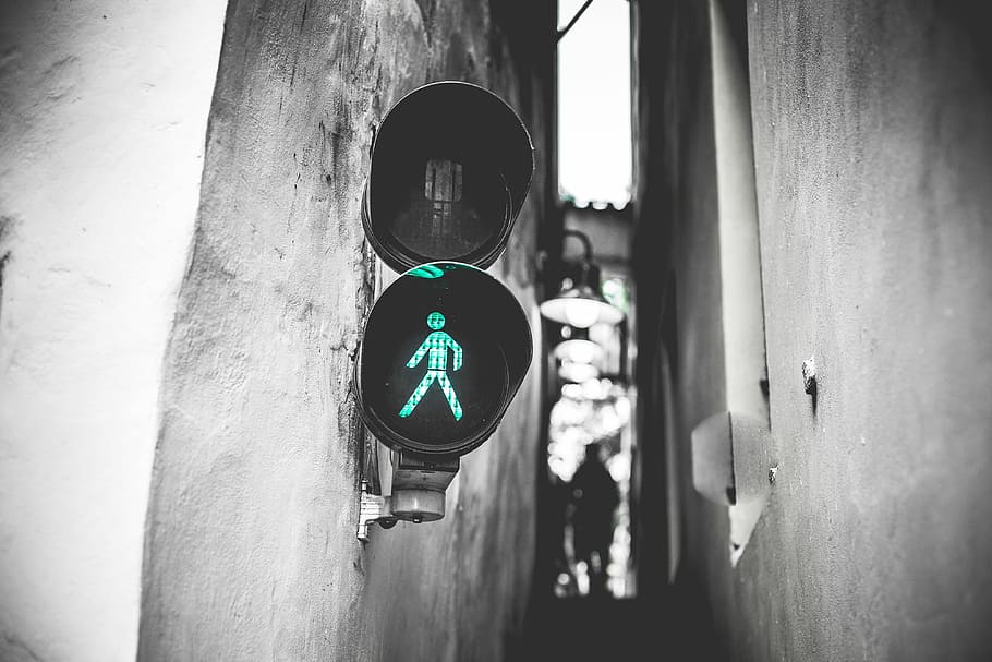 Green Traffic Light Walk Signal in Prague Narrowest Street, architecture