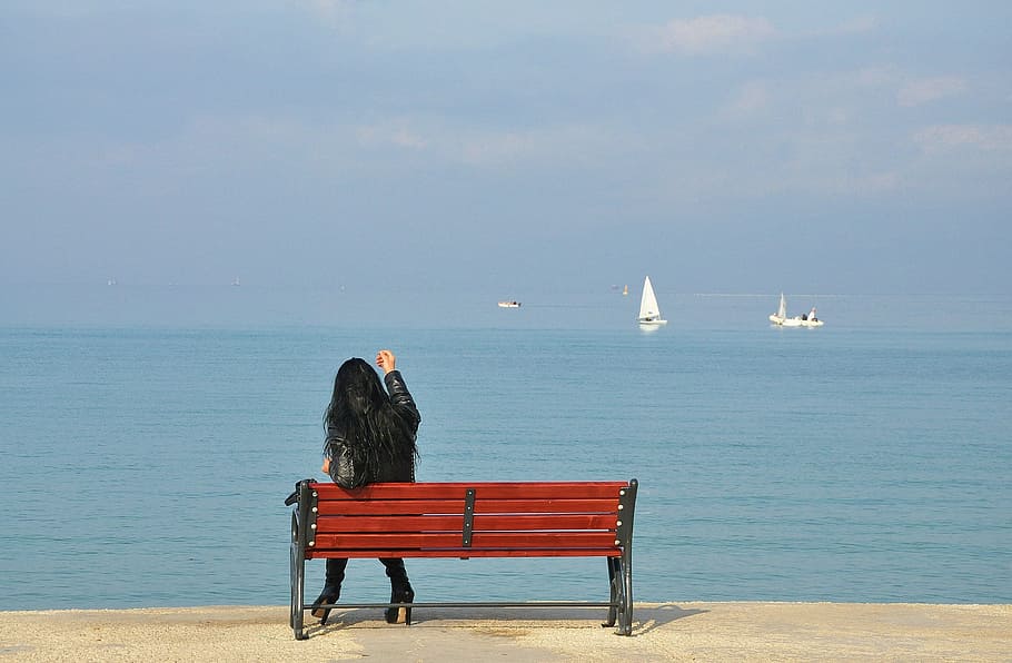 woman sitting on bench facing at a body of water, ship, boat, HD wallpaper