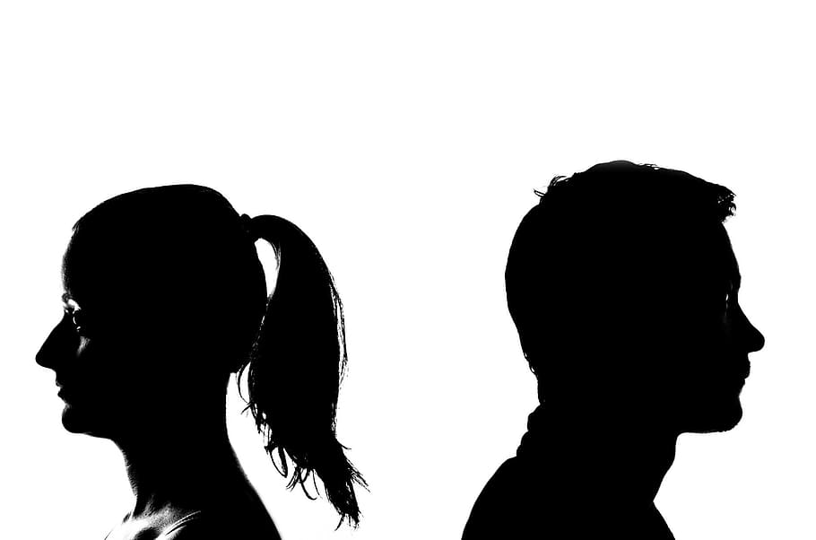 silhouette photo of man and woman behind each other, breakup