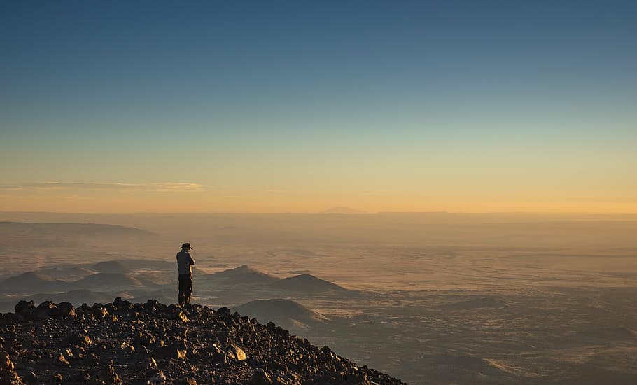 person standing on hill, man, mountain, blue, sky, ridge, summit HD wallpaper
